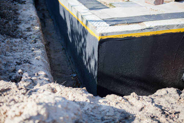 Professional Emergency Waterproofing technician working in Pulaski, TN